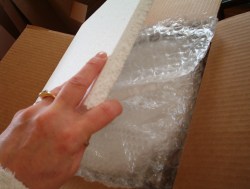 finish off with styrofoam before placing into the next larger padded box.